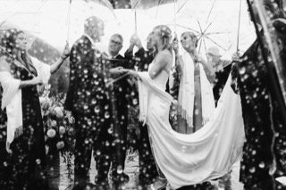Ceremony: bride, groom, catch, confetti, newlywed, rain