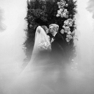 Ceremony: wedding dress, bride, groom, couple, fog, kiss