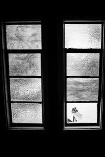 The Couple: dark, out, room, snow, window, window sill