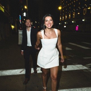 The Couple: business suit, cocktail dress, dress, night, road, smile