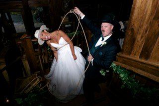 The Couple: wedding dress, bride, groom, catch, cocktail dress, rope