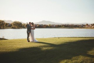 The Couple: bride, groom, couple, golf course, kiss, lake