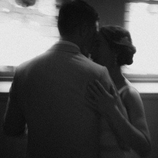 The Couple: couple, hug, stand, window