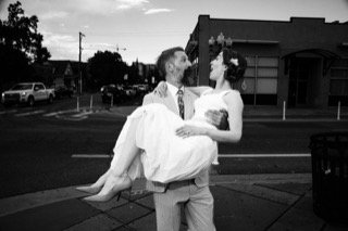 The Couple: catch, couple, dress, hug, stand, street corner