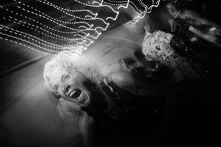 Dancing: christmas light, dance, dance floor, face, light, laugh