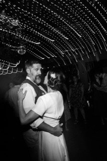 Dancing: canopy, ceiling, christmas light, couple, dance, dance floor