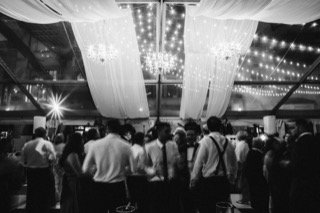 Dancing: canopy, ceiling, chandelier, pillar, crowd, curtain