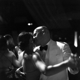 Dancing: bow tie, bride, groom, cocktail dress, couple, dance