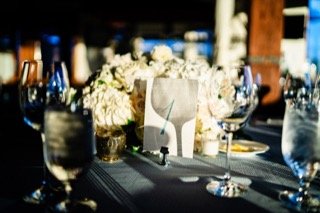 Details and Moments: centerpiece, cloth, pillar, table, dinning table, plate