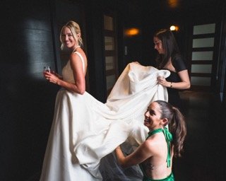 Details and Moments: adjust, wedding dress, bride, bridesmaid, cloth, doorway