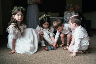 Family and Loved Ones: carpet, child, dress, floor, flower girl, game