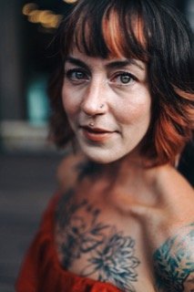 Family and Loved Ones: arm, bangs, chest, brunette, cosmetic, dress