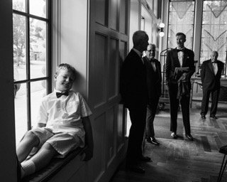 Family and Loved Ones: bow tie, child, cocktail dress, doorway, ledge, sit