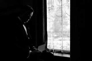 Getting Ready: bow tie, business suit, cocktail dress, curtain, dark, laptop