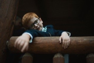 Getting Ready: balustrade, beam, bow tie, business suit, child, cocktail dress
