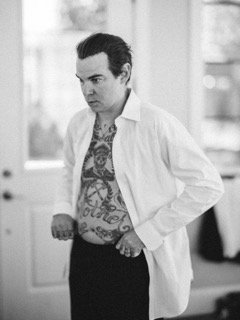 Getting Ready: belly, coat, doorway, dress shirt, hip, lab coat