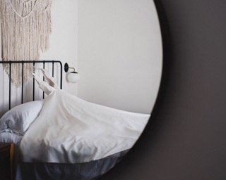 Getting Ready: bed, bedroom, blanket, lamp, curtain, dresser